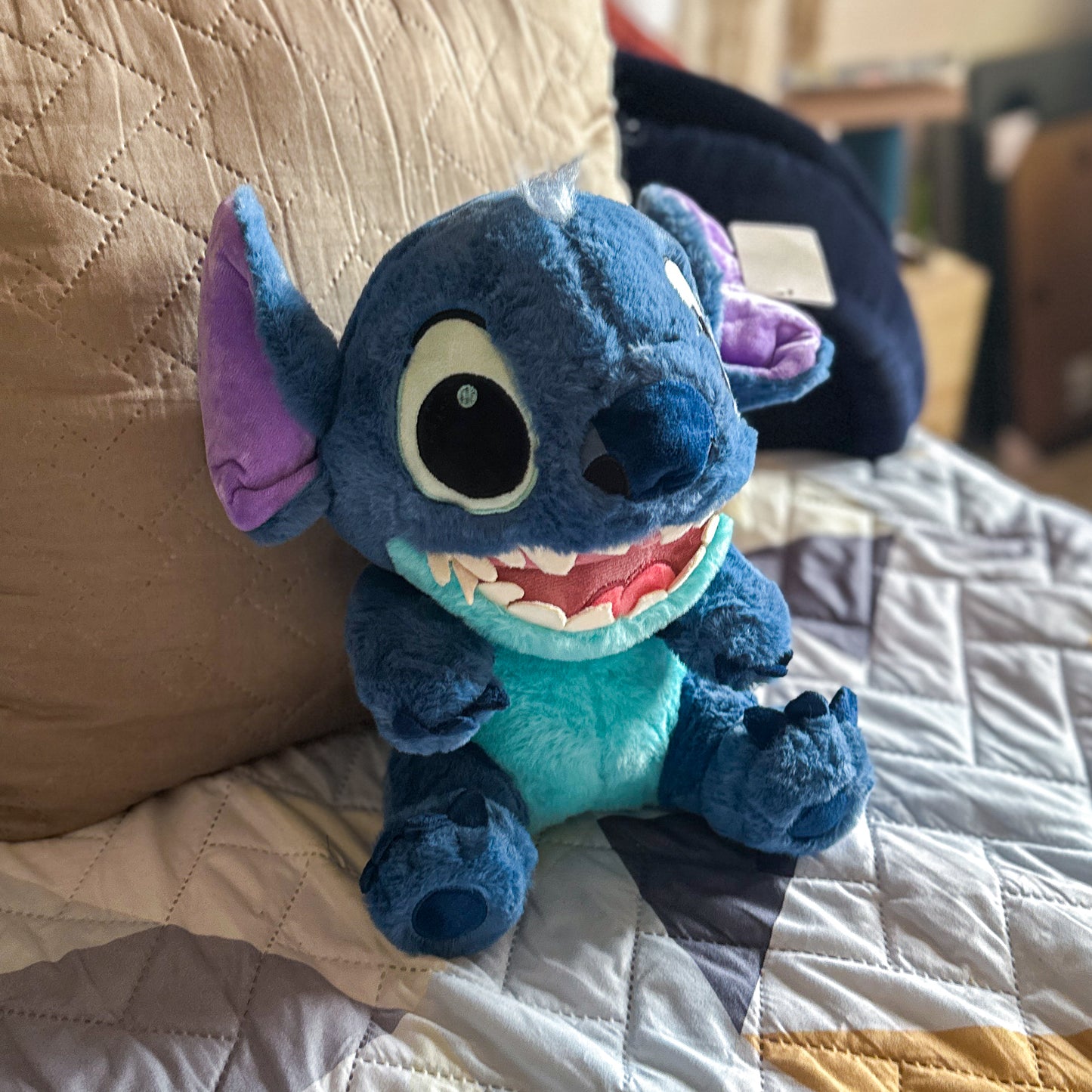 Peluche Stitch sentado