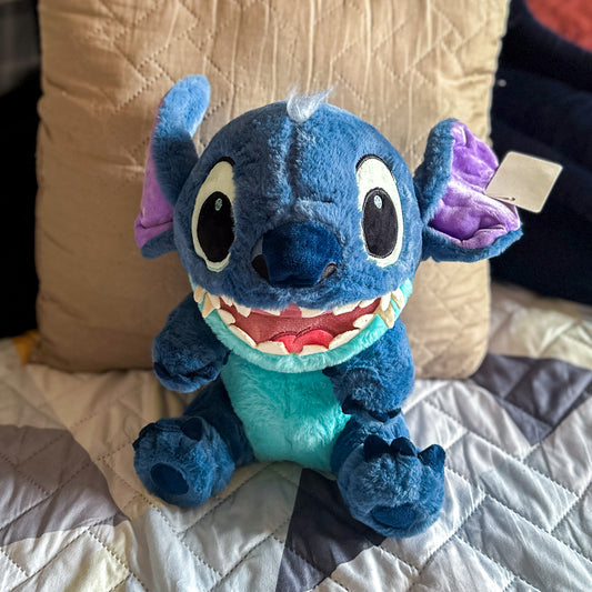 Peluche Stitch sentado