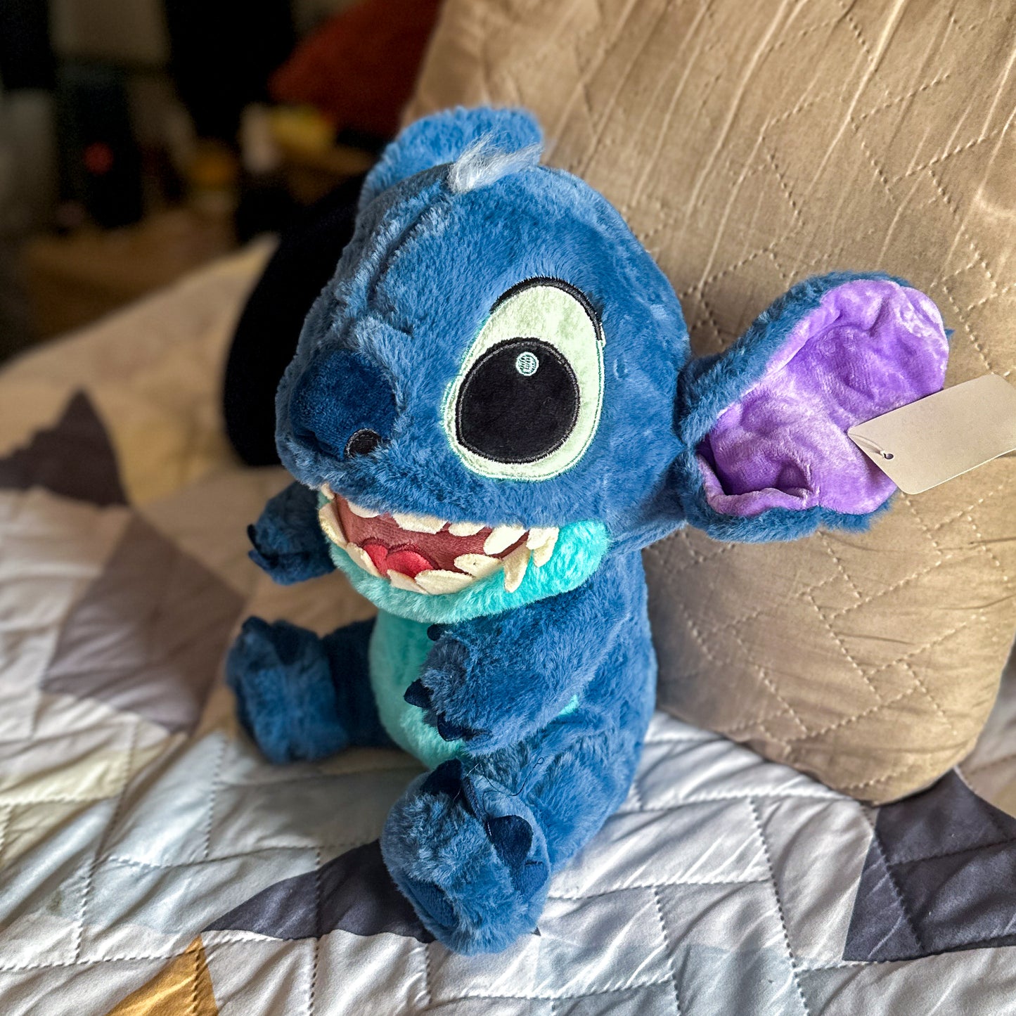 Peluche Stitch sentado